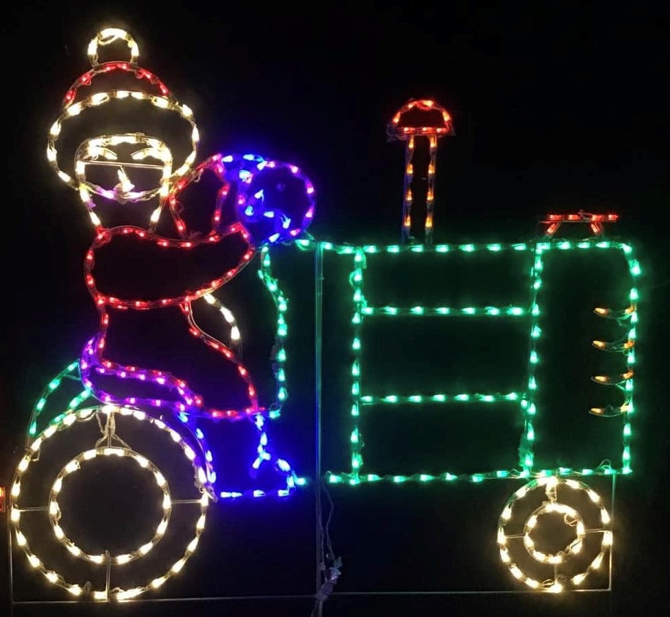Mrs. Claus Driving Tractor