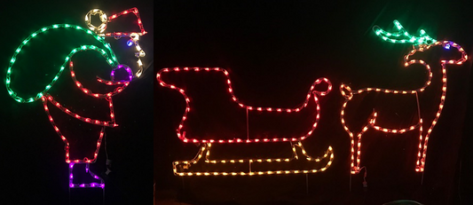 Santa Loading Sleigh with Reindeer