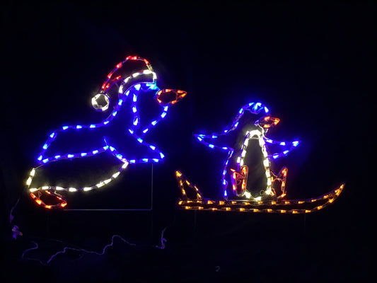 Penguin Pushing Baby Sled