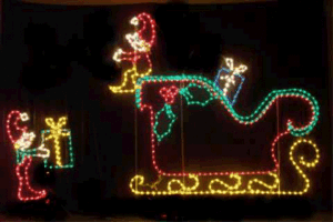 Illuminated elf in store sleigh