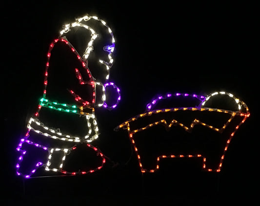 Santa Kneeling at Nativity