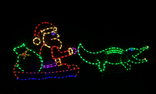 Cajun Santa in Pirogue Boat Pulled By Gator